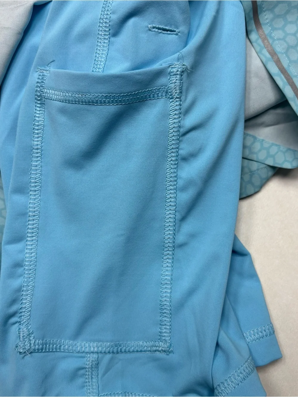 DSG Light Blue Performance Shorts with Hex Accent
